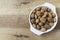 Close up of walnuts, hazelnuts and almonds on wooden table