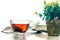 Close up warm black tea cup on wooden table in living room , re