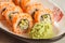Close up wasabi and sushi rolls - Uramaki California on the plat