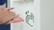 Close up washing hands with an automatic alcohol sanitizer dispenser at mall. Woman hand for alcohol gel under auto sanitizer anti