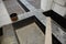 A close-up on waterproofing, damp proofing flooring with bitumen paint spray, liquid rubber foundation and basement sealant