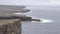 Close up of waves crashing on cliffs, Aran islands, Ireland