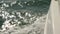 Close-up of waves of the Irish Sea. Boat waves strong sea white foamy waves.