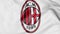 Close-up of waving flag with AC Milan football club logo, 3D rendering