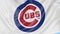 Close-up of waving flag with Chicago Cubs MLB baseball team logo, seamless loop, blue background. Editorial animation