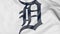 Close-up of waving flag with Detroit Tigers MLB baseball team logo, 3D rendering