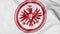 Close-up of waving flag with Eintracht Frankfurt football club logo, 3D rendering