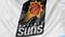 Close-up of waving flag with Phoenix Suns NBA basketball team logo, seamless loop, blue background. Editorial animation