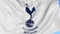 Close-up of waving flag with Tottenham Hotspur F.C. football club logo