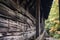 close-up of weathered wood on a covered bridge