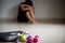 Close up weighing Scale in front of upset woman with measuring tape, pink dumbbell and green apple. Healthy lifestyle, food and