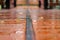 Close up the Wet wood floor with falled leaves at outdoor field after the rain comes