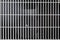 Close up of white air conditioner grille. Electronics industry a