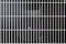 Close up of white air conditioner grille. Electronics industry and Material concept. Background and texture theme