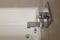 Close up of white bathtub with chrome fixtures