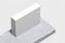 Close up of white blank cardboard box on concrete pedestal, showcase. 3d rendering. Empty space. Copy space.