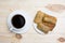 Close up white coffee cup and pancakes with cottage cheese on wooden table