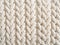 a close up of a white knitted fabric