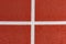 Close up on a white line in artificial red turf, on a street basketball, handball, volleyball, futsal, rugby, hockey and football