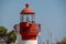 Close up of white and red lighthouse