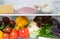 Close-up, in the White Refrigerator food stock, on the top shelf are eggs, fish, mushrooms, cottage cheese, turkey meat, cheese,