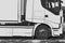 Close-up of a white truck with semi-trailer. Illustration