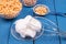 Close-up of a white whipped chickpea Aquafaba on a blue background. Aquafaba is a great substitute for chicken eggs with vegetable