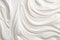 Close up of white whipped cream swirl texture for background and design