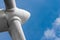 Close-up of white wind turbine propeller on sky