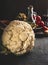 Close up of whole cauliflower on dark rustic kitchen table background. Copy space