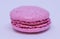 The close up of whole pink macaron.