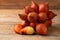 Close up Whole of Salak Salacca zalacca fruit on wooden plate background