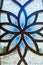 Close-up of the window with delicate floral ornament in the Sheikh Zayed Mosque