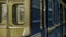 Close up for windows of the underground carriage at the subway station. Moving windows of an empty metro train.