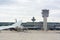 Close up of Wing of Airplane on Airplane waiting for Maintenance at the Airport Background