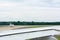 Close Up of Wing of an Airplane on another Airplane during Take Off Operations Background