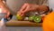 Close up of a woman cutting apple