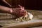 Close up of woman , female hands preparing Balkan cheese pie