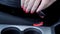 Close up of woman hand fastening car seat belt for safety