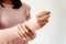 Close-Up of Woman Hand is Massaging Her Wrist Pain From Homework. Muscle Illness and Office Syndrome Concept. Healthcare and