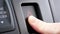 Close up of woman hand pressing stop emergency light button