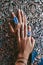 Close up of woman hands with gem stones jewelry accessories