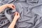 Close up of woman hands hanging curtain