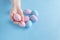 Close up of woman hands holding colored easter eggs