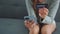 Close up of woman hands holding credit card and smartphone. Young woman paying online using banking entering data shopping order