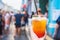 Close Up Of Woman Hands Holding Fruit Cocktail at walking street market.Phuket.Thailand