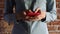 Close up of woman hands holding mobile phone and using mobile apps