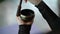 Close-up of woman hands playing on small Tibetan Singing Bowl.