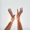 Close up of woman hands wrapped in New Year`s light. Gesture of getting ready for New Years eve.