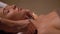 Close up of woman having hot stone massage at spa